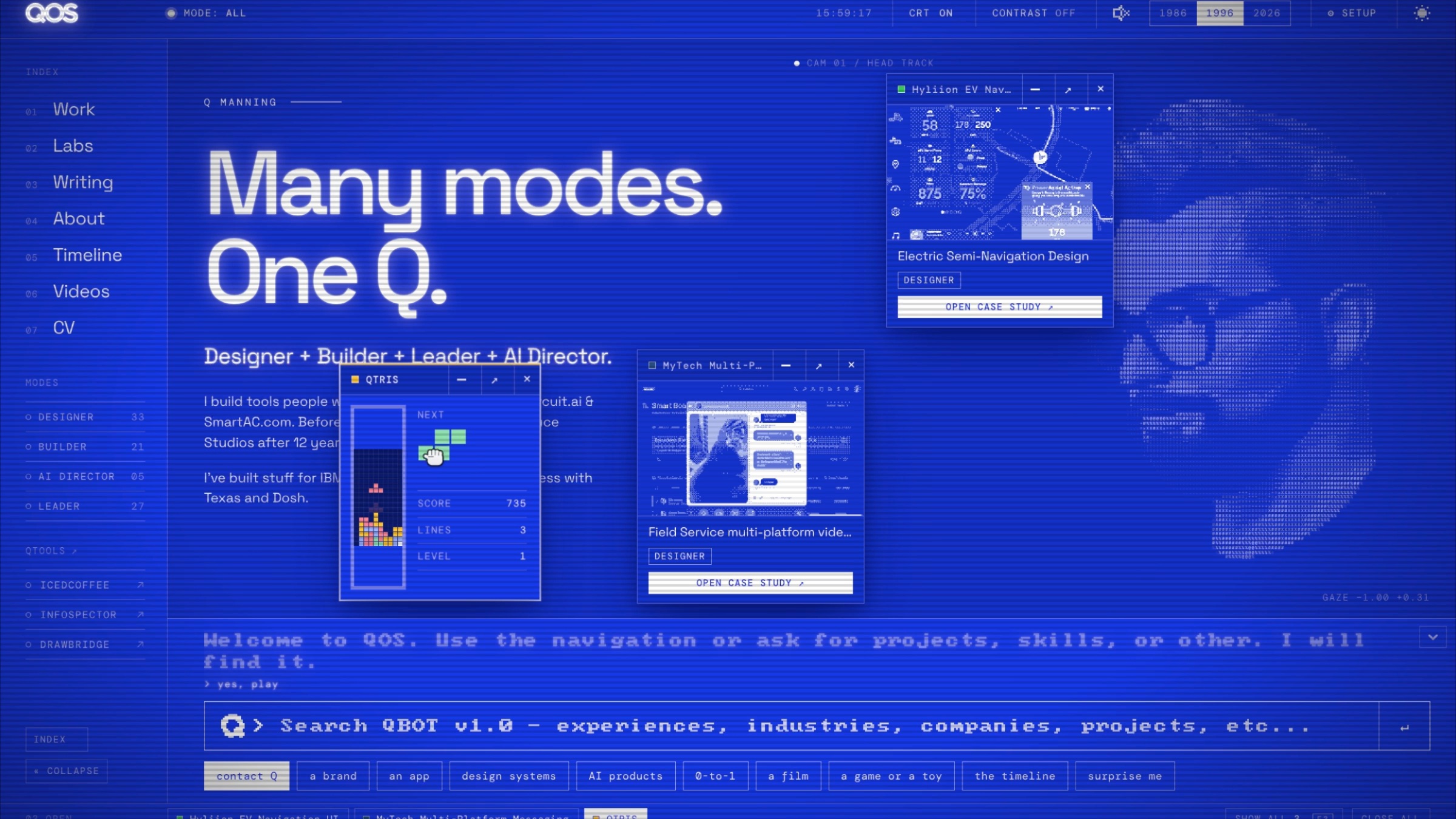 The QOS desktop with several windows open above the prompt bar.